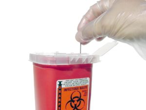 What should I do if I come into contact with body fluids?
